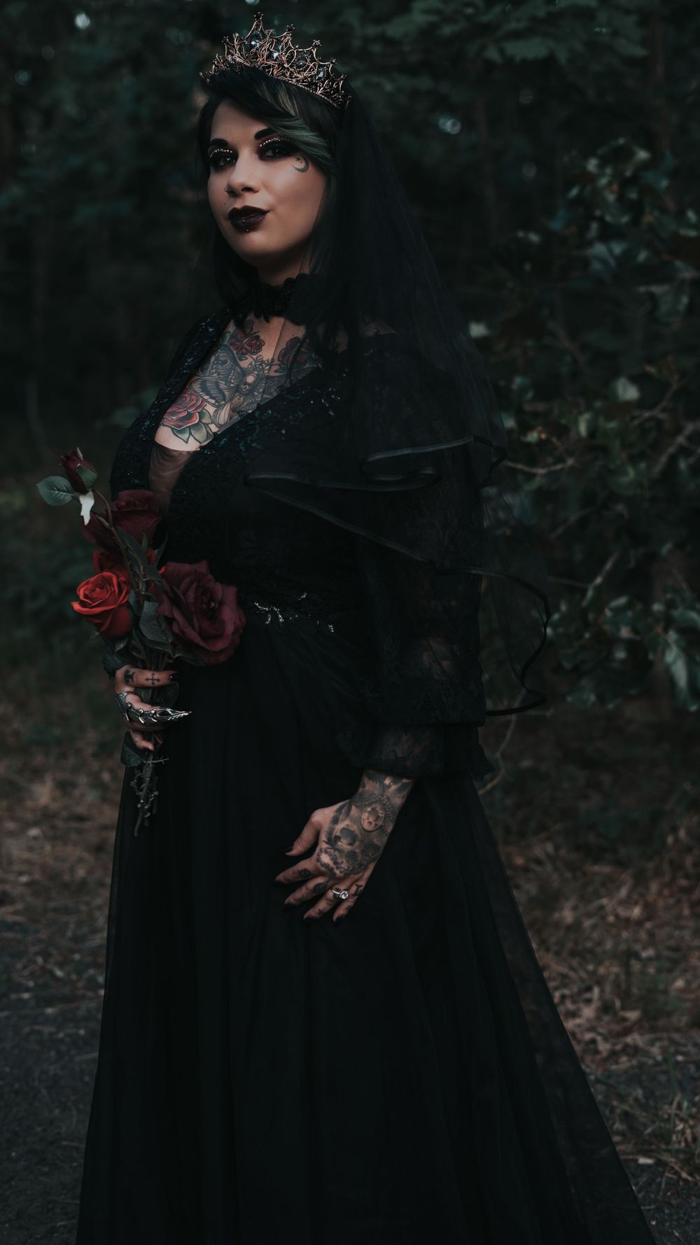 Side profile of a gothic tattooed bride at her elopement