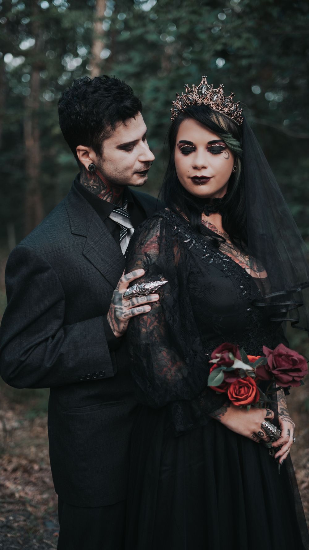 Bride and groom Alt standing as he lookes at her with admeriation photograph