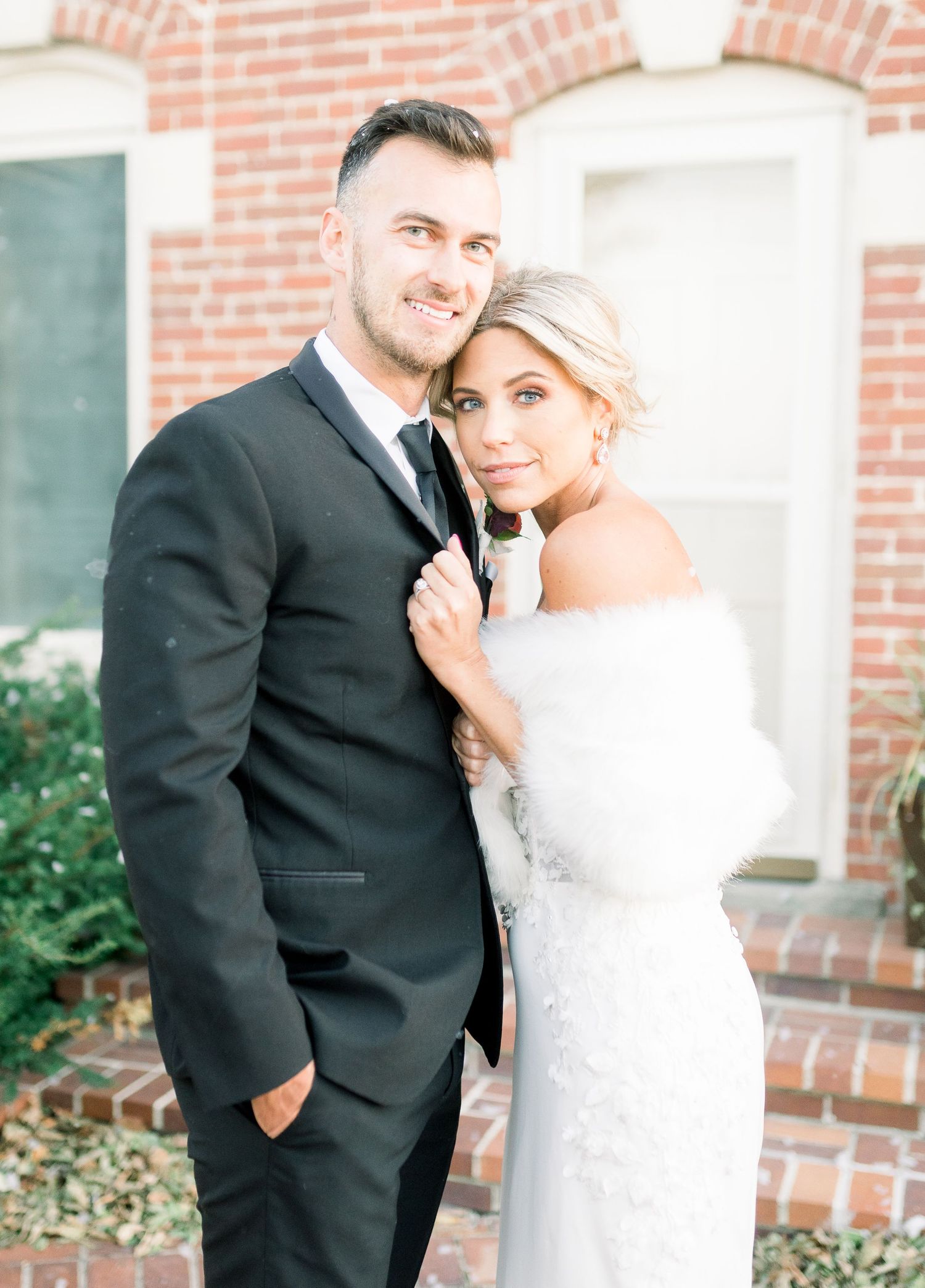 winter wedding at 1868 Farmhouse Wedding in Boone, Iowa with Modern Dress bridal gown
