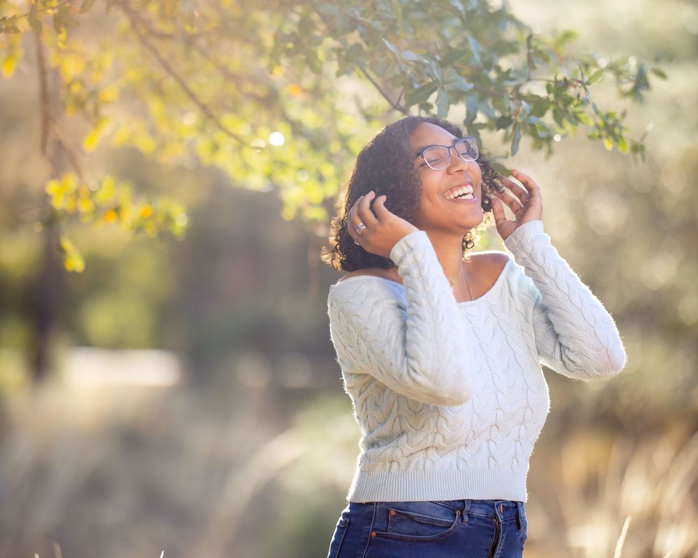 Marlee among pine trees during senior session in Mount Lemmon. Tucson, AZ senior portraits