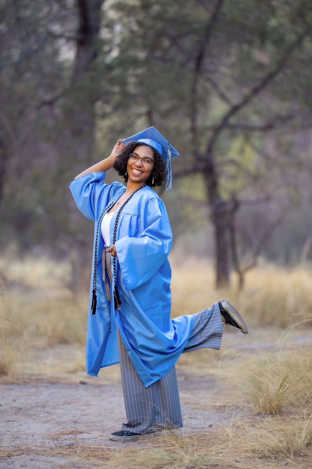 Marlee among pine trees during senior session in Mount Lemmon. Tucson, AZ senior portraits