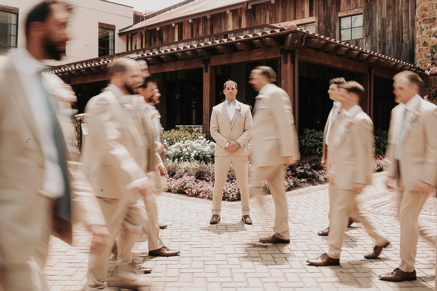 Modern Long Expsure photo of the groomsmen posing with the groom at the drover hotel