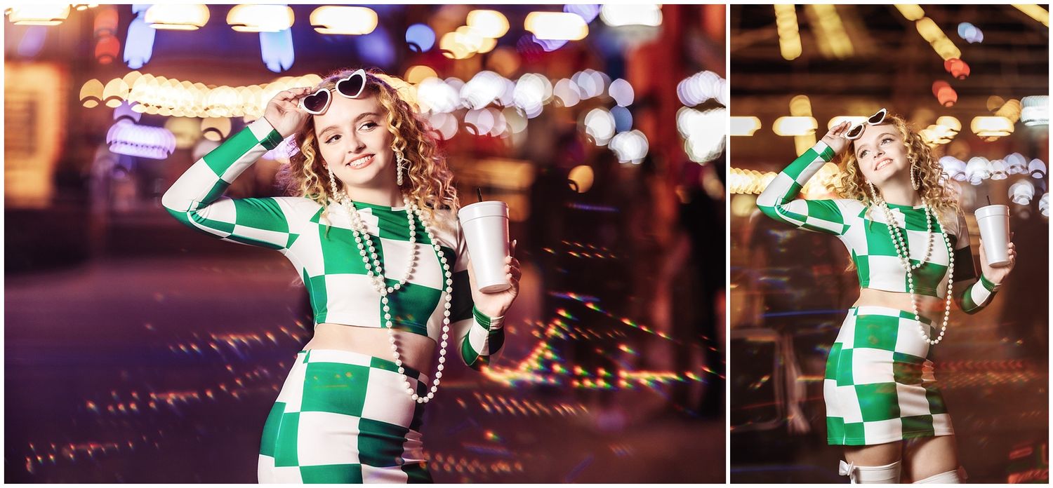 A figure wearing a green and white checkered dress poses energetically against a blurred city backdrop at night.