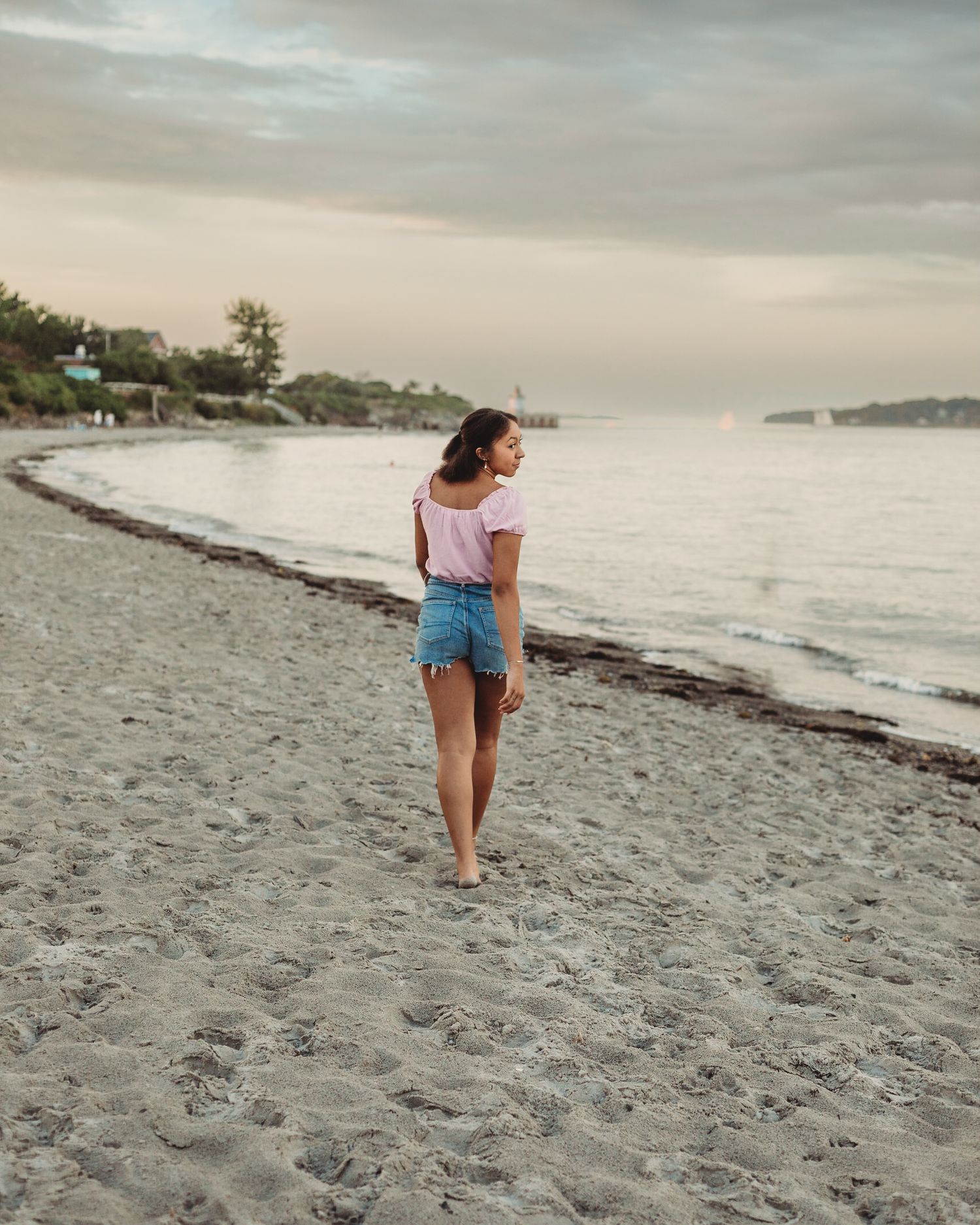 Professional senior photo of a girl on the beach