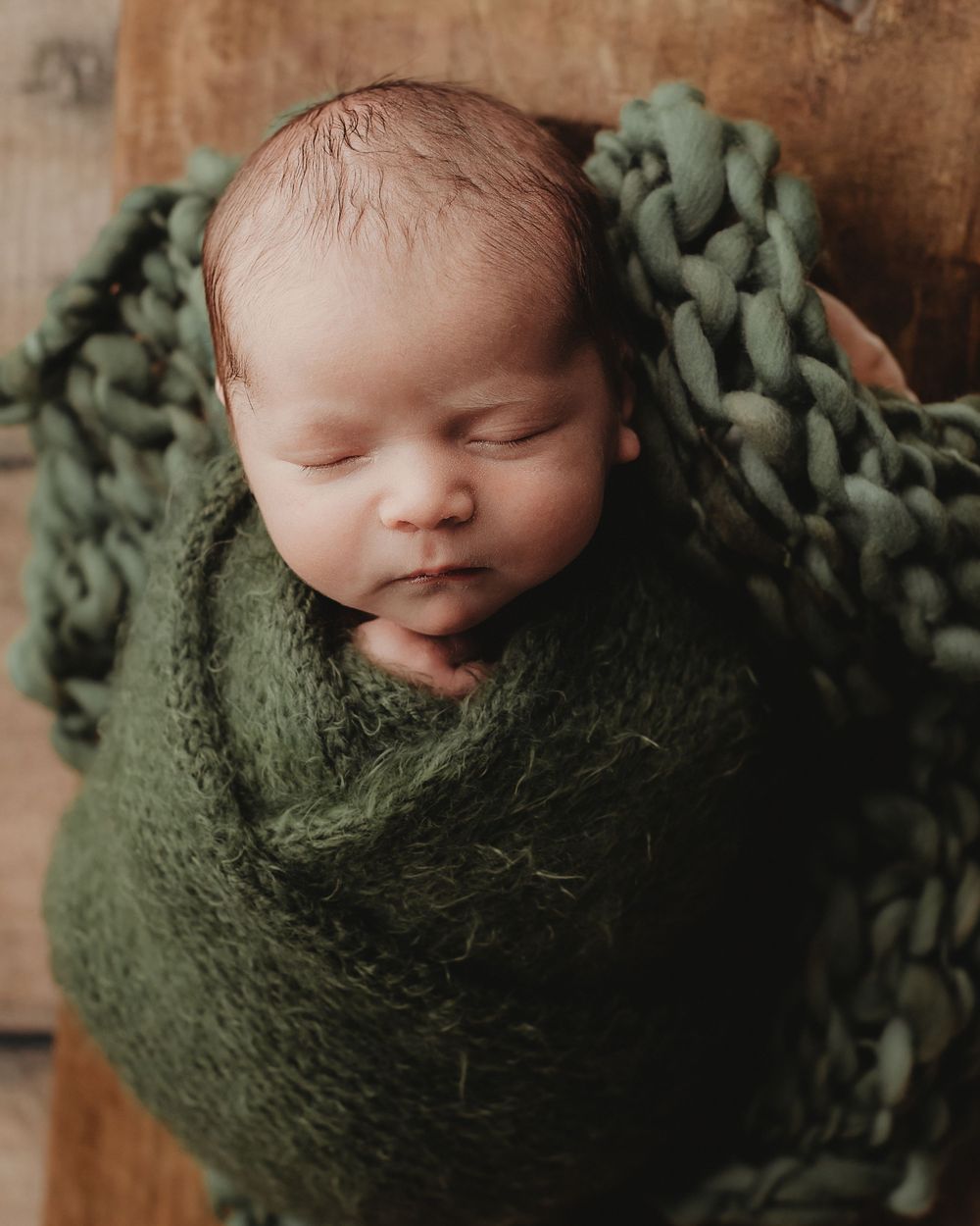 Professional newborn photo - green