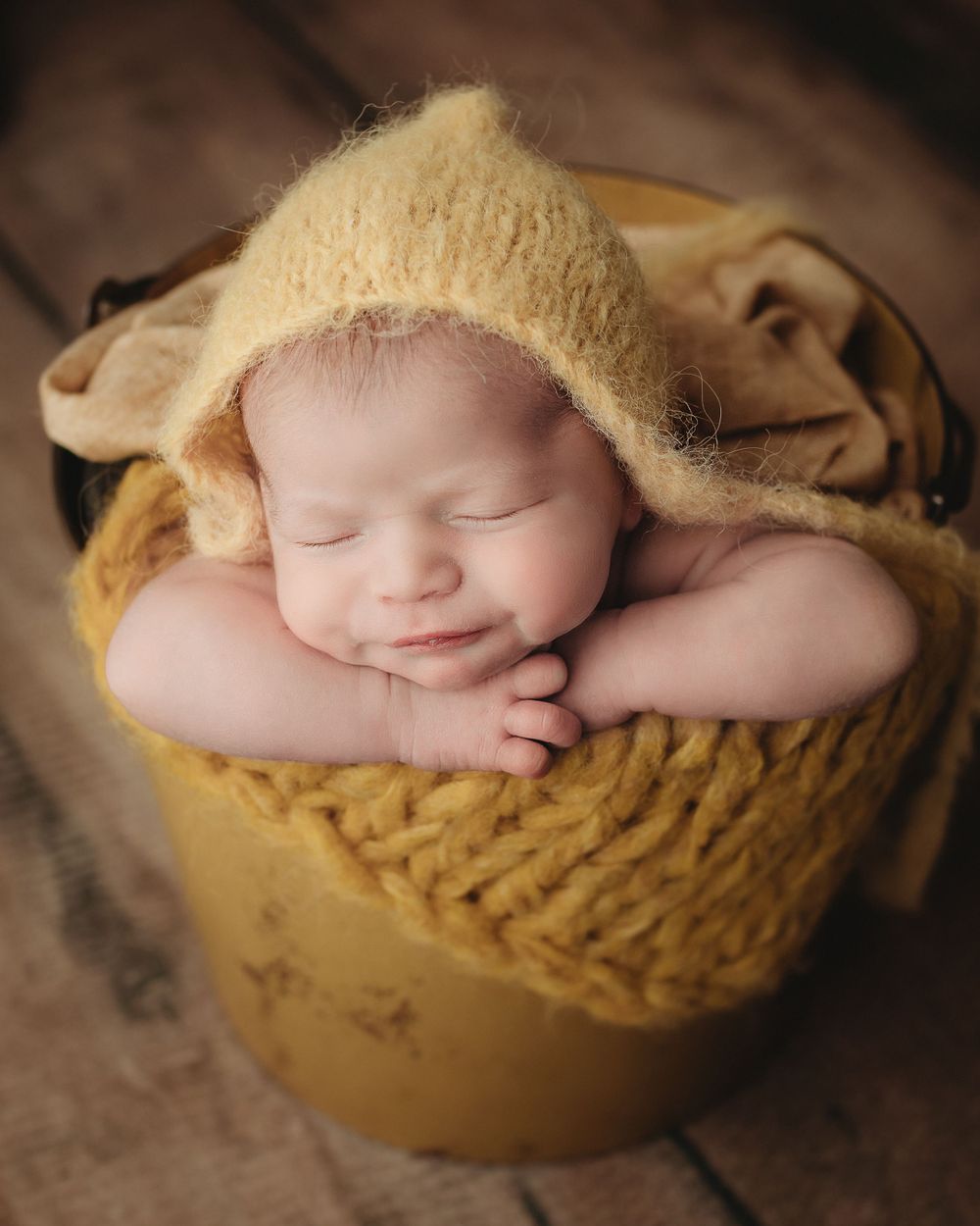 Professional newborn photo - yellow