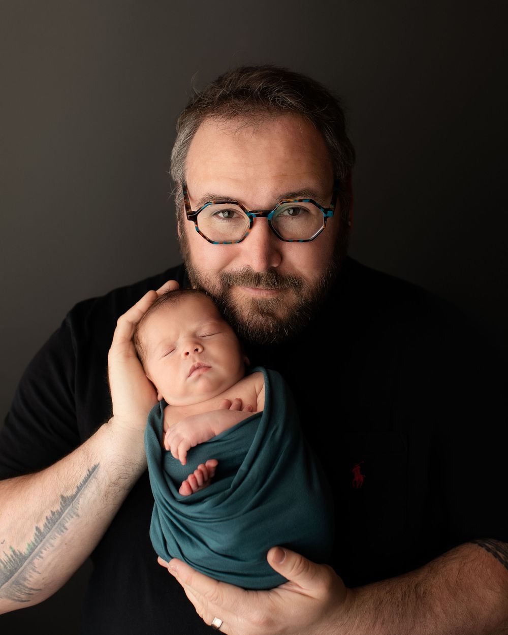 Professional newborn photo with dad