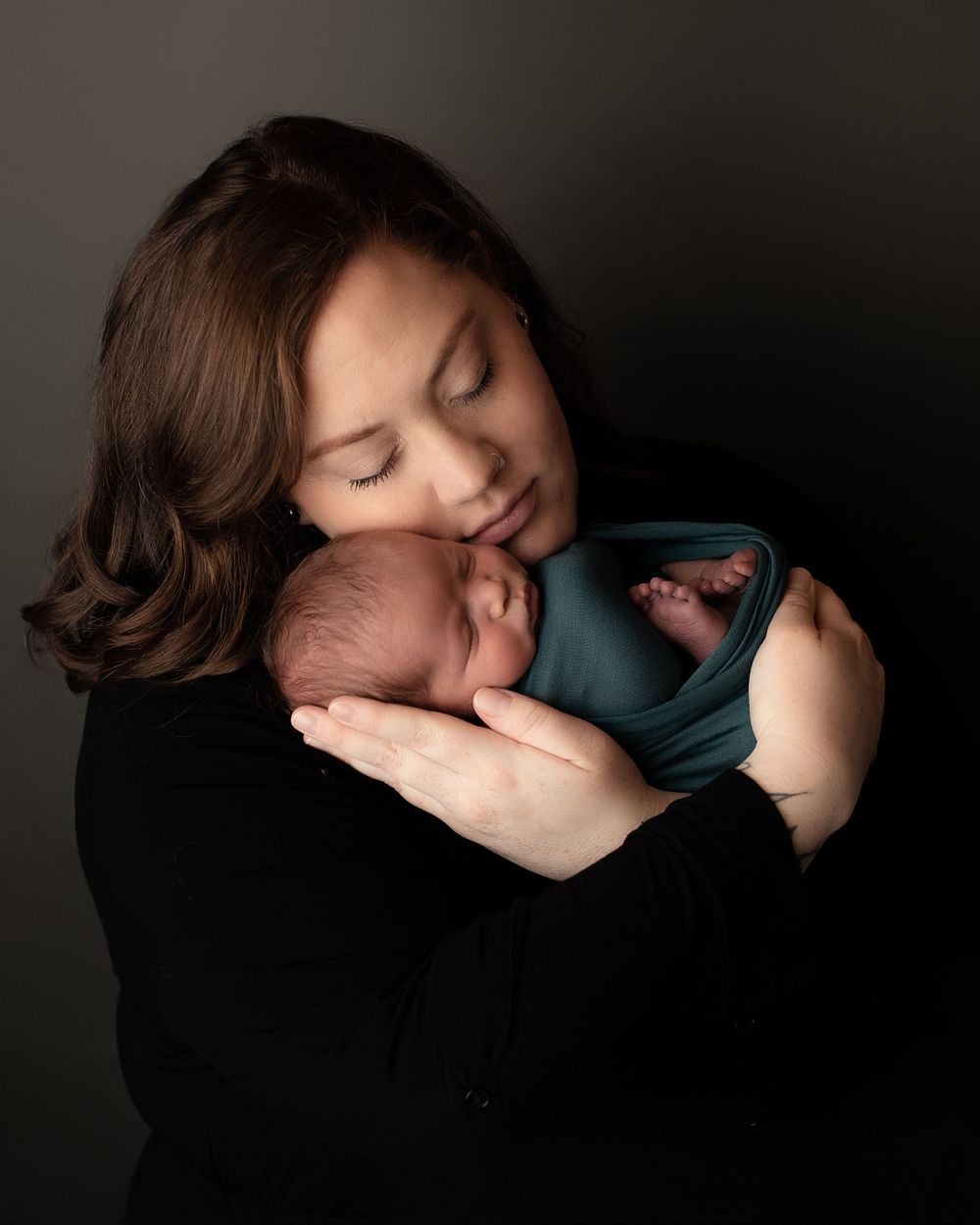 Professional newborn photo with mom