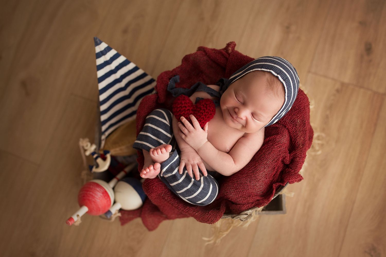 smiling newborn baby boy cute babies laying in bucket detres