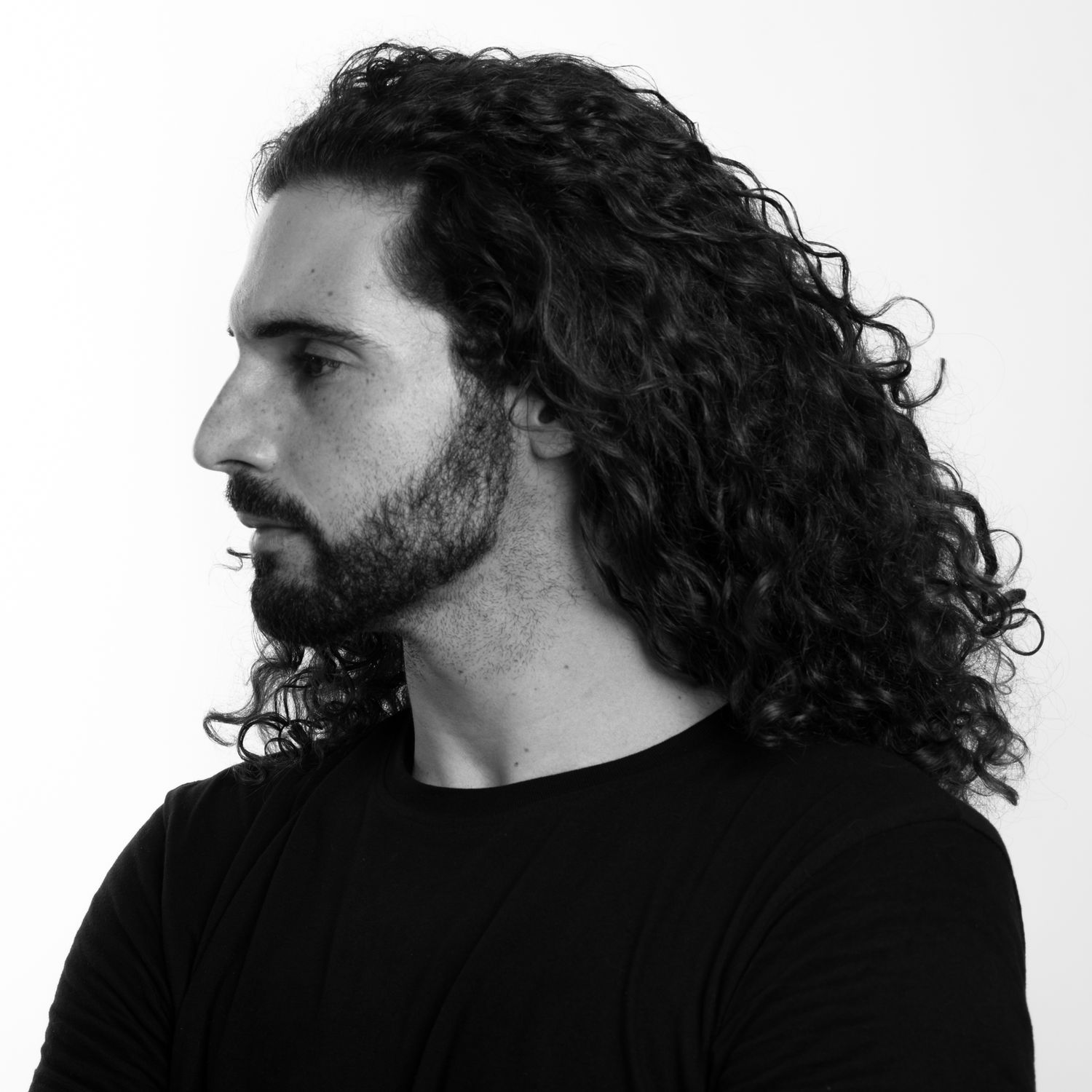 A self portrait of Logan C Thomas that he used to demonstrate 4 lighting setups he uses for corporate headshots.