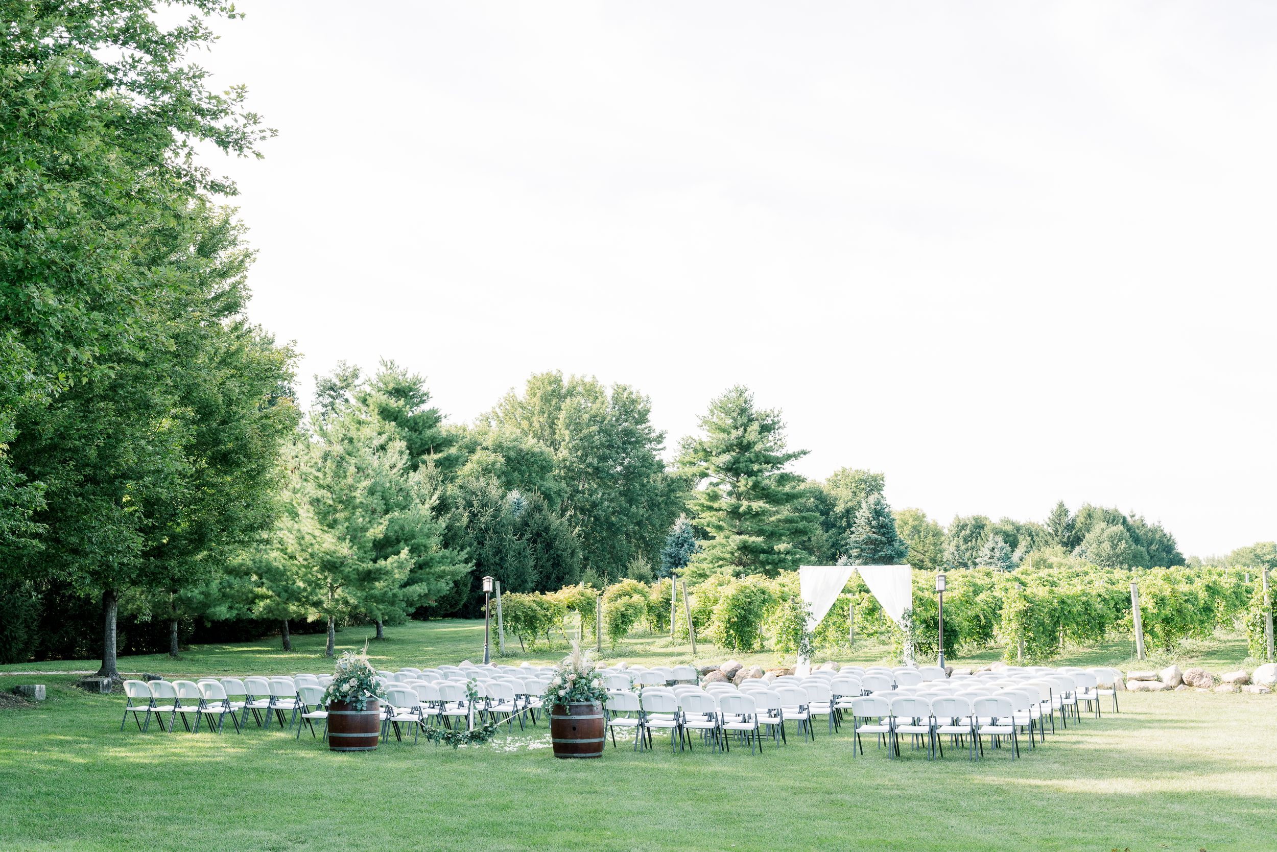 Vineyard photos with white willow events at Prairie Moon Winery wedding in Ames, Iowa