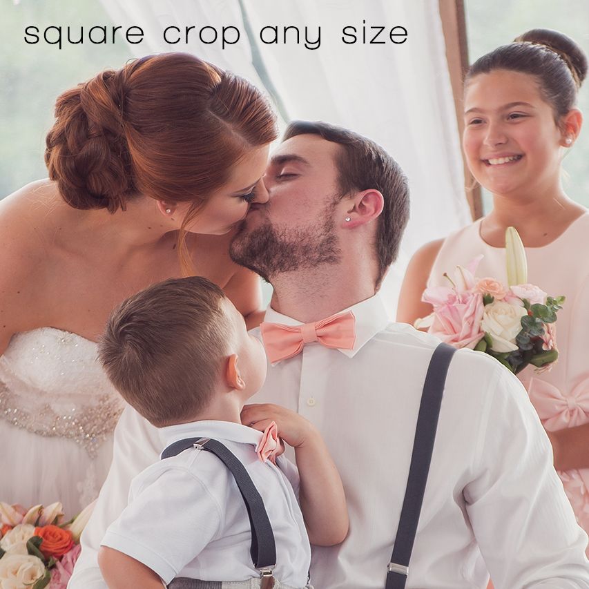 bride and groom kissing while children look on