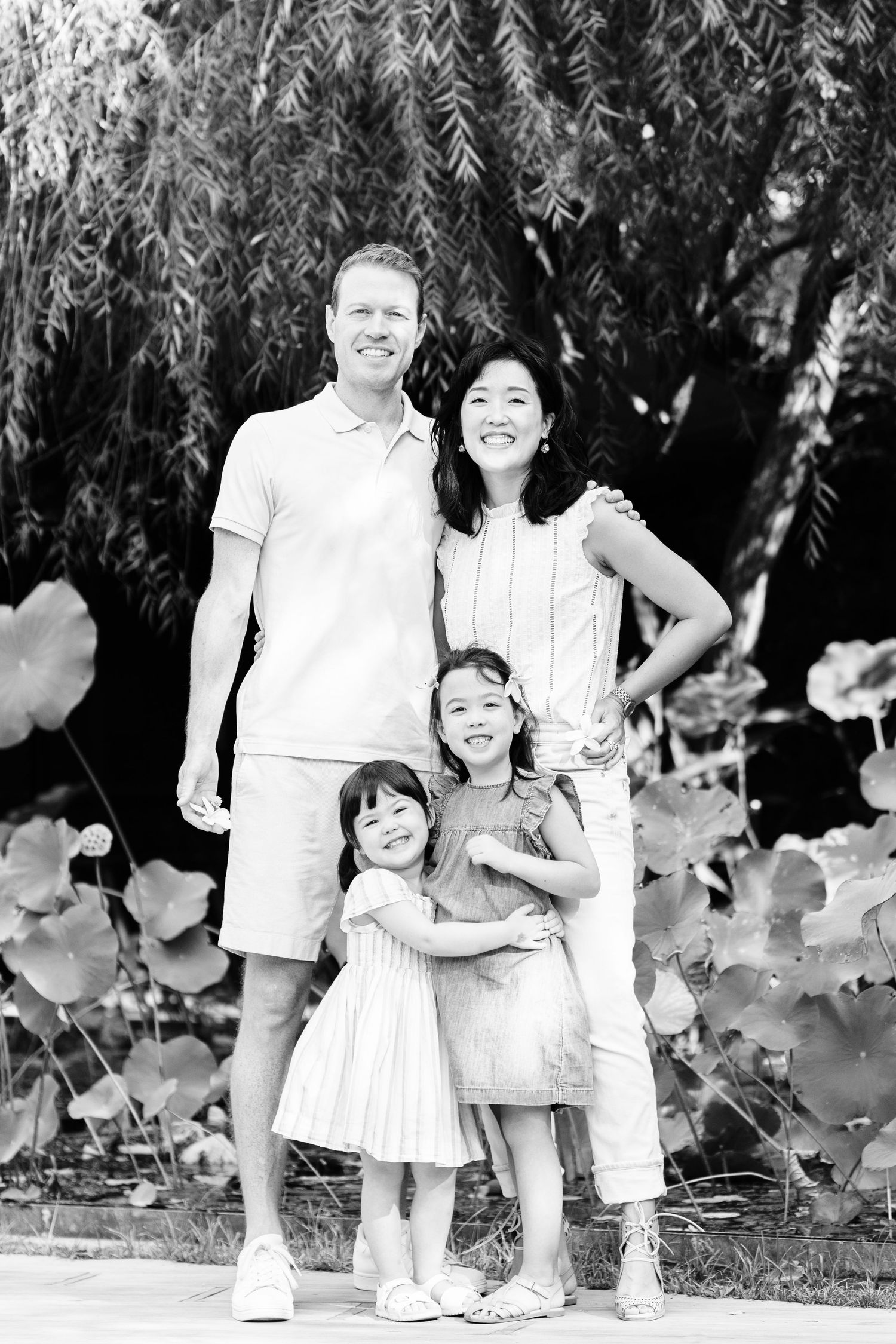 black and white family portrait at cloudgate dance theatre in taiwan