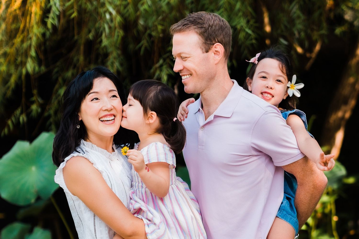 family portrait in front of lily flowers in taiwan
