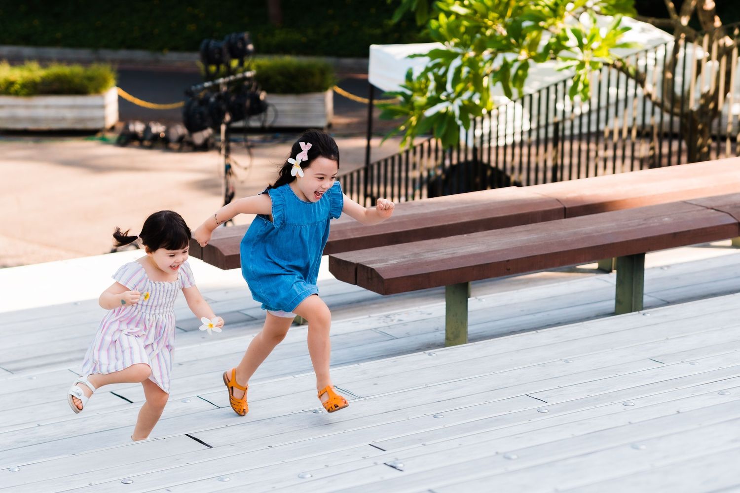 two girls racing up the stairs