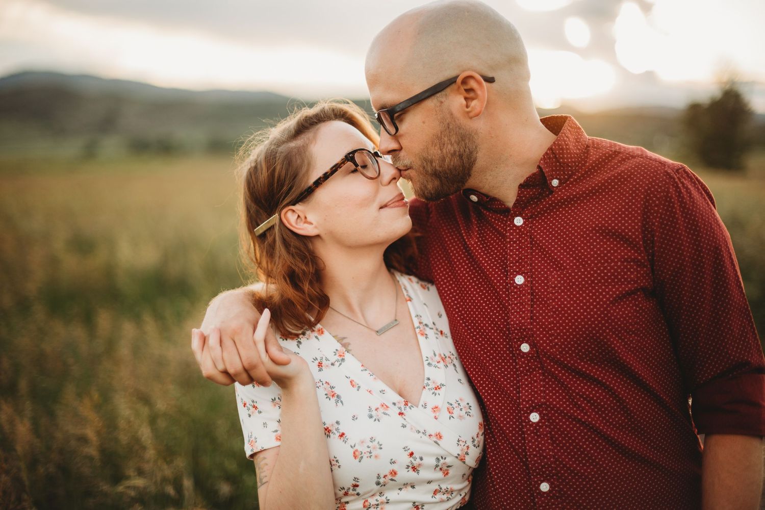 A couple gets their photos taken during their engagement session at Reservoir Ridge Natural Area in Fort Collins.