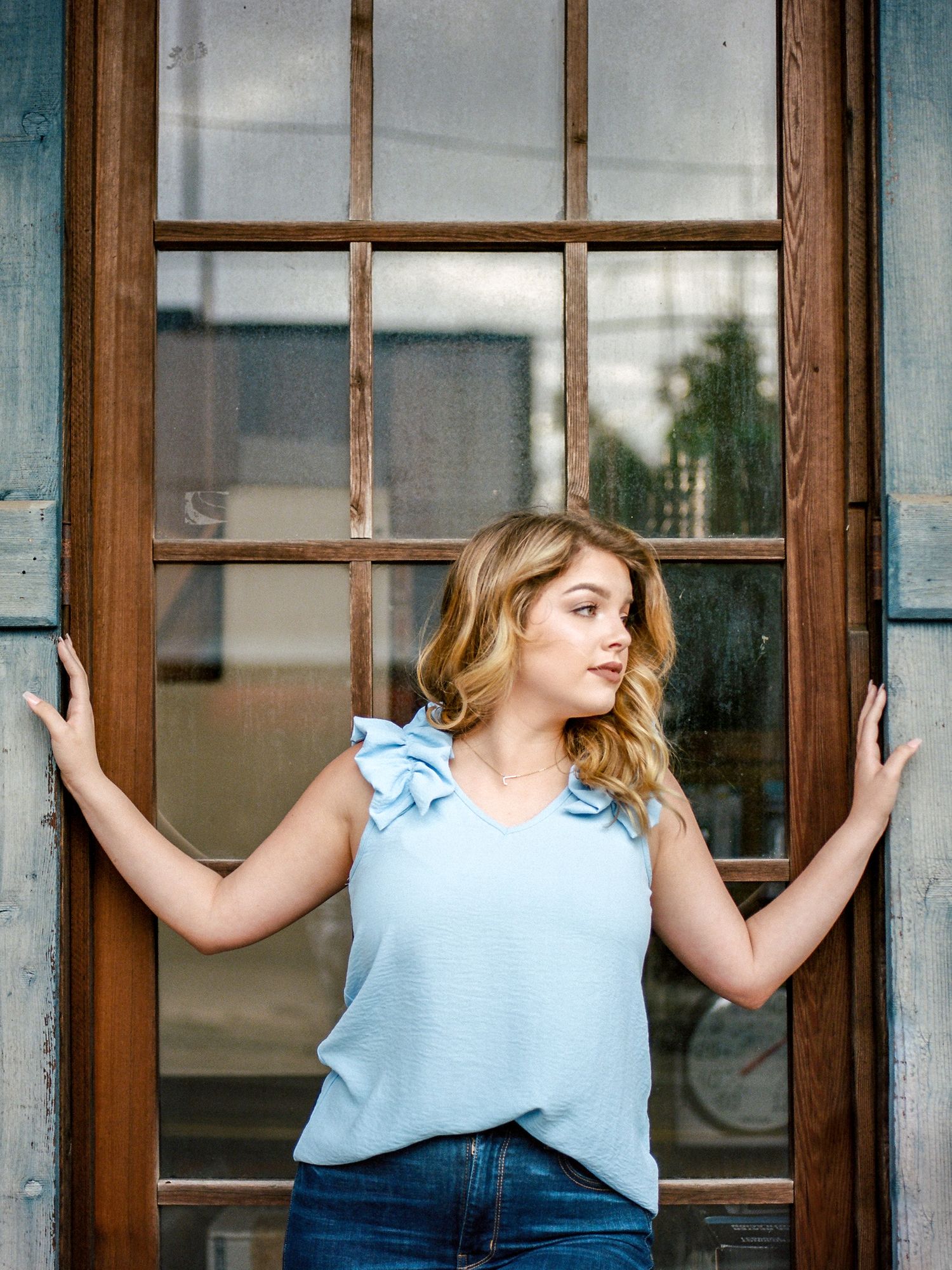 Louisiana senior portrait of female Franklinton High School student on streets of downtown Covington
