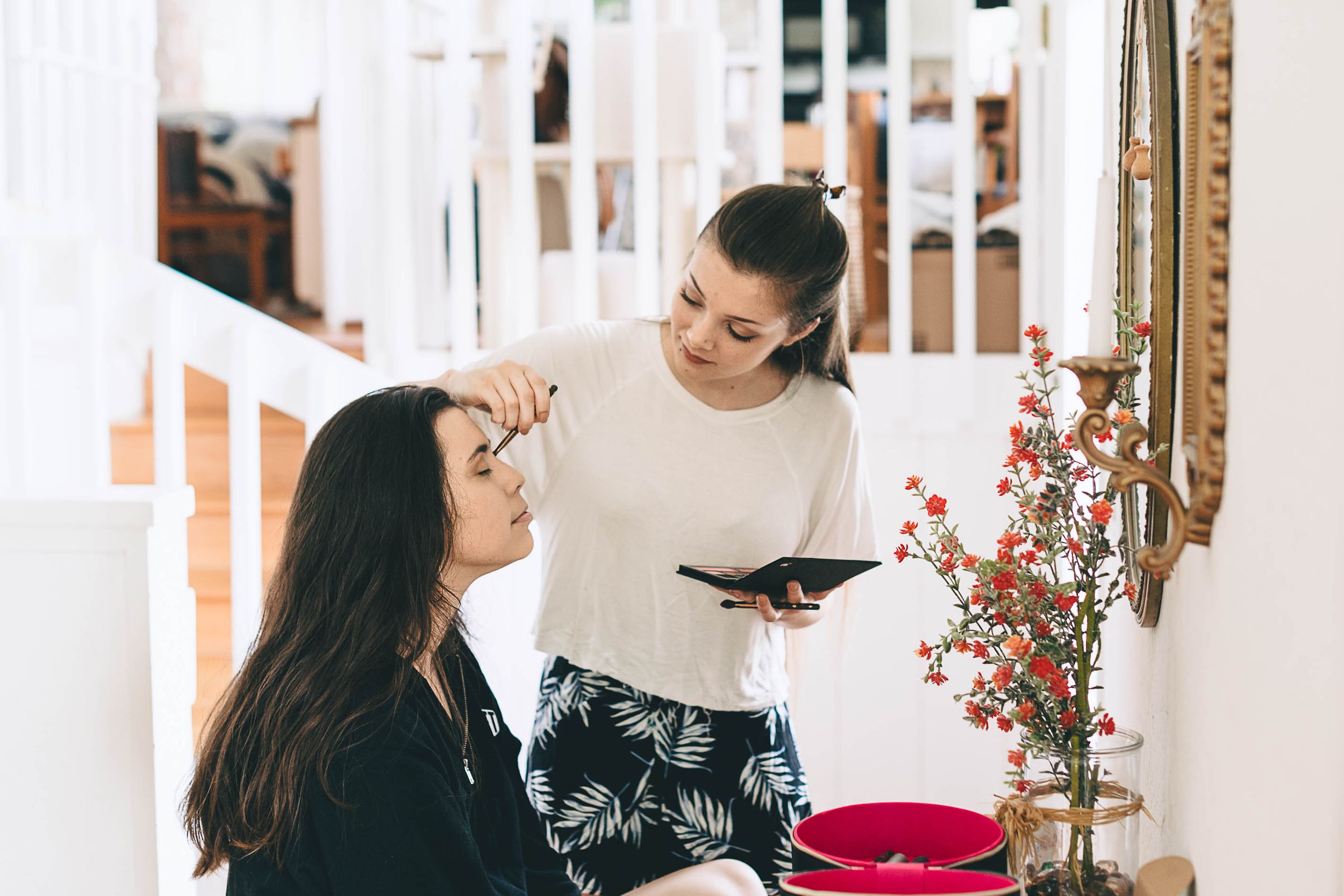 Bride getting her make up done.