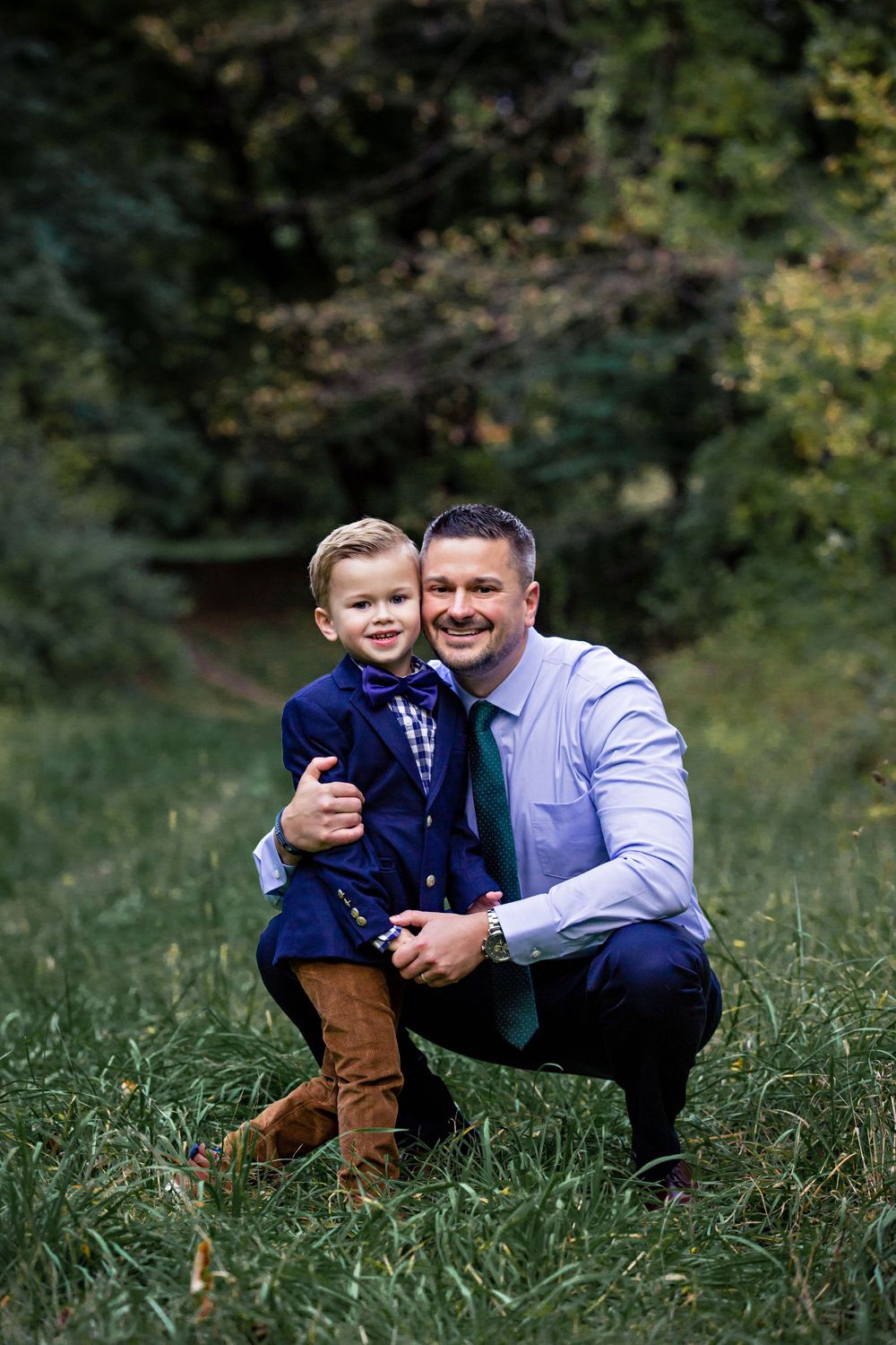 father hugging son