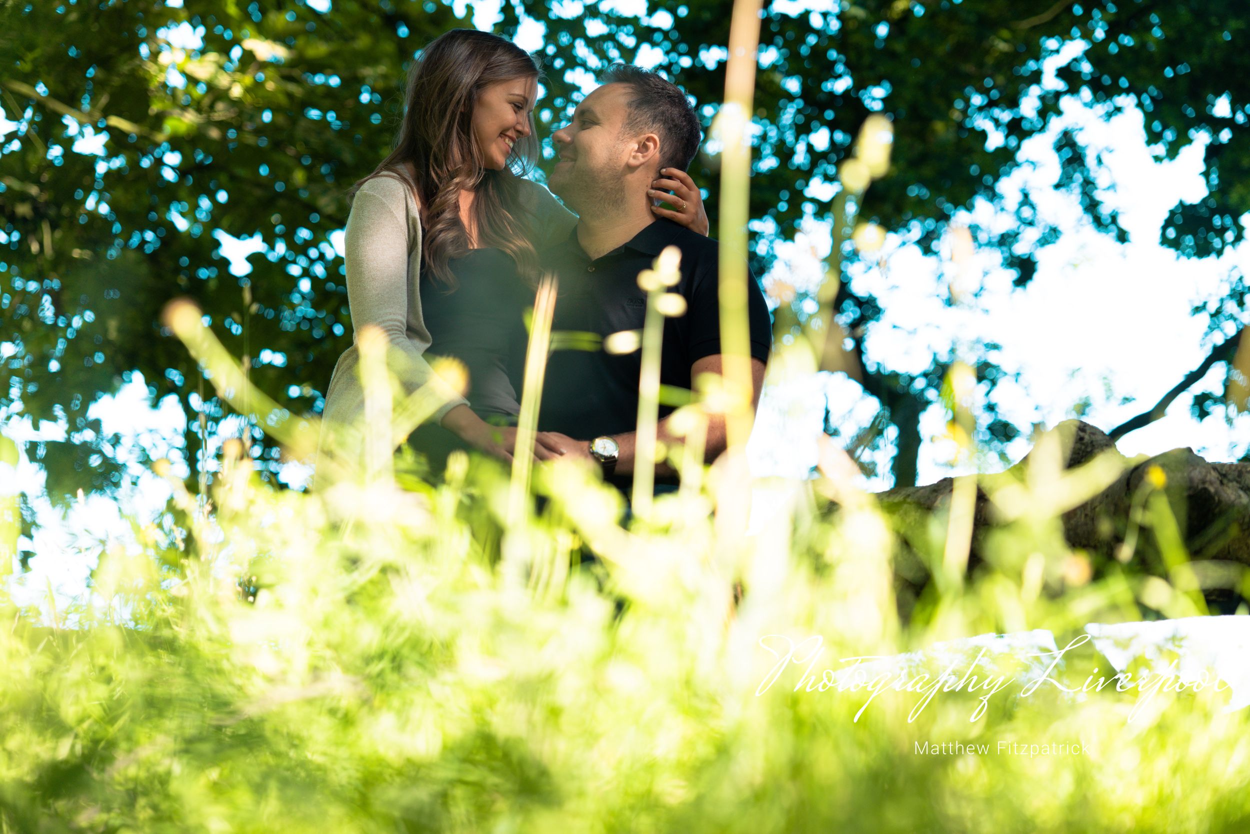 Naturally posed engagement photography at Sefton Park by Photography Liverpool Wedding Photographer
