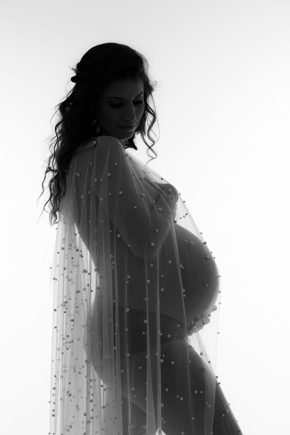 Séance photo grossesse en studio à Neuchâtel – Immortalisez ce moment unique de votre grossesse
