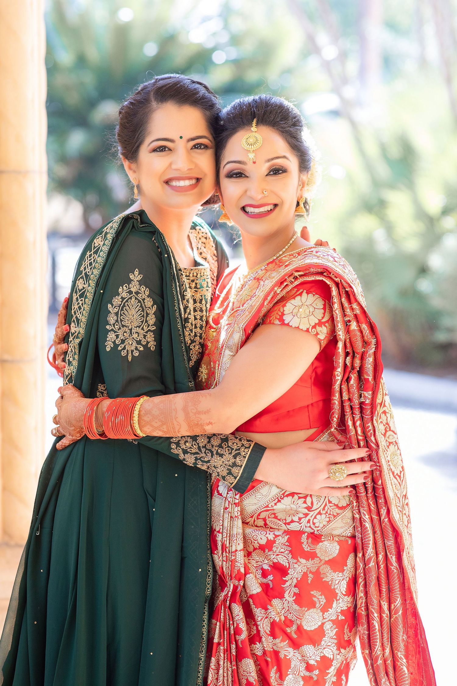 Indian bride with friend in red dress Florida Wedding