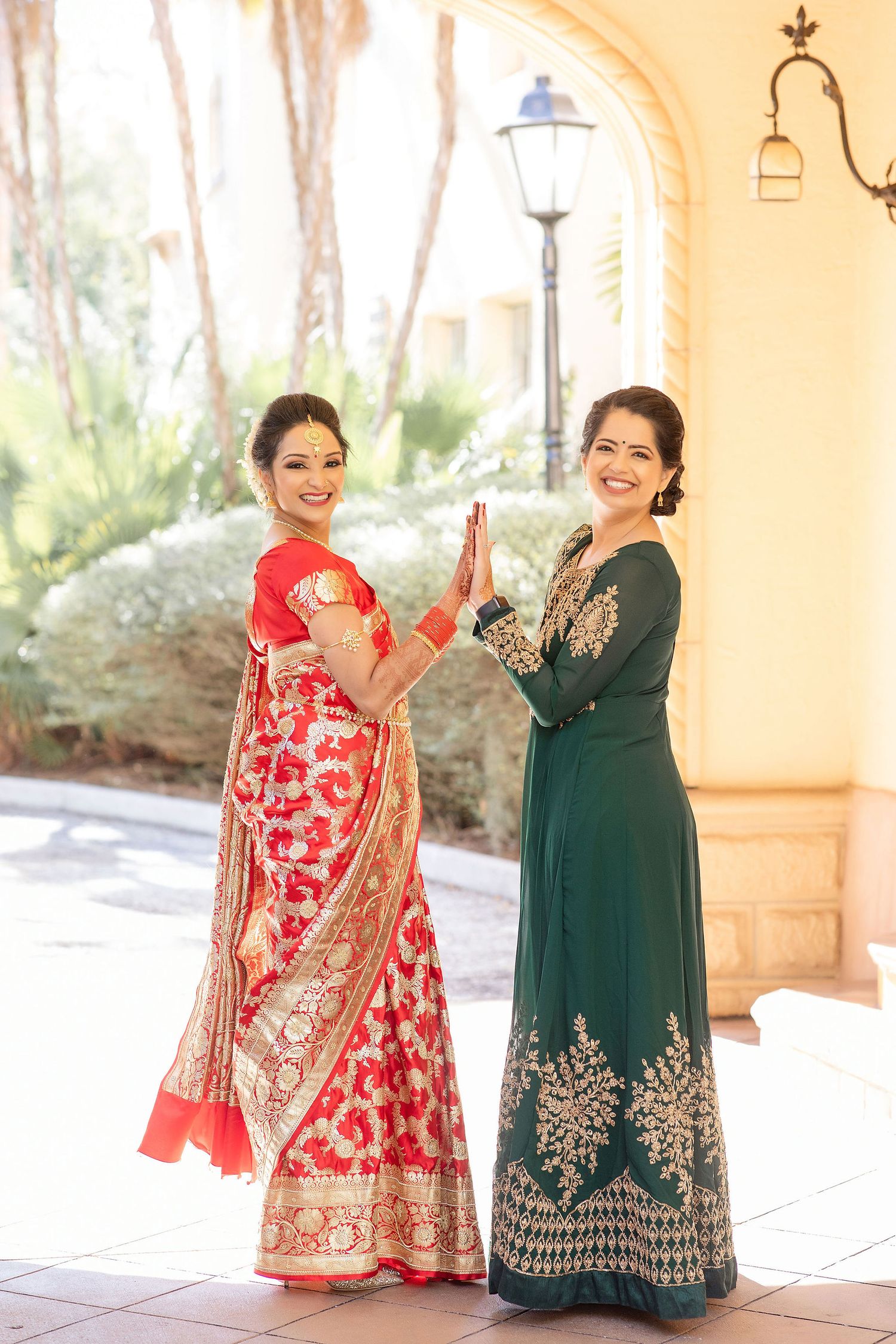 Indian bride with friend in red dress Florida Wedding