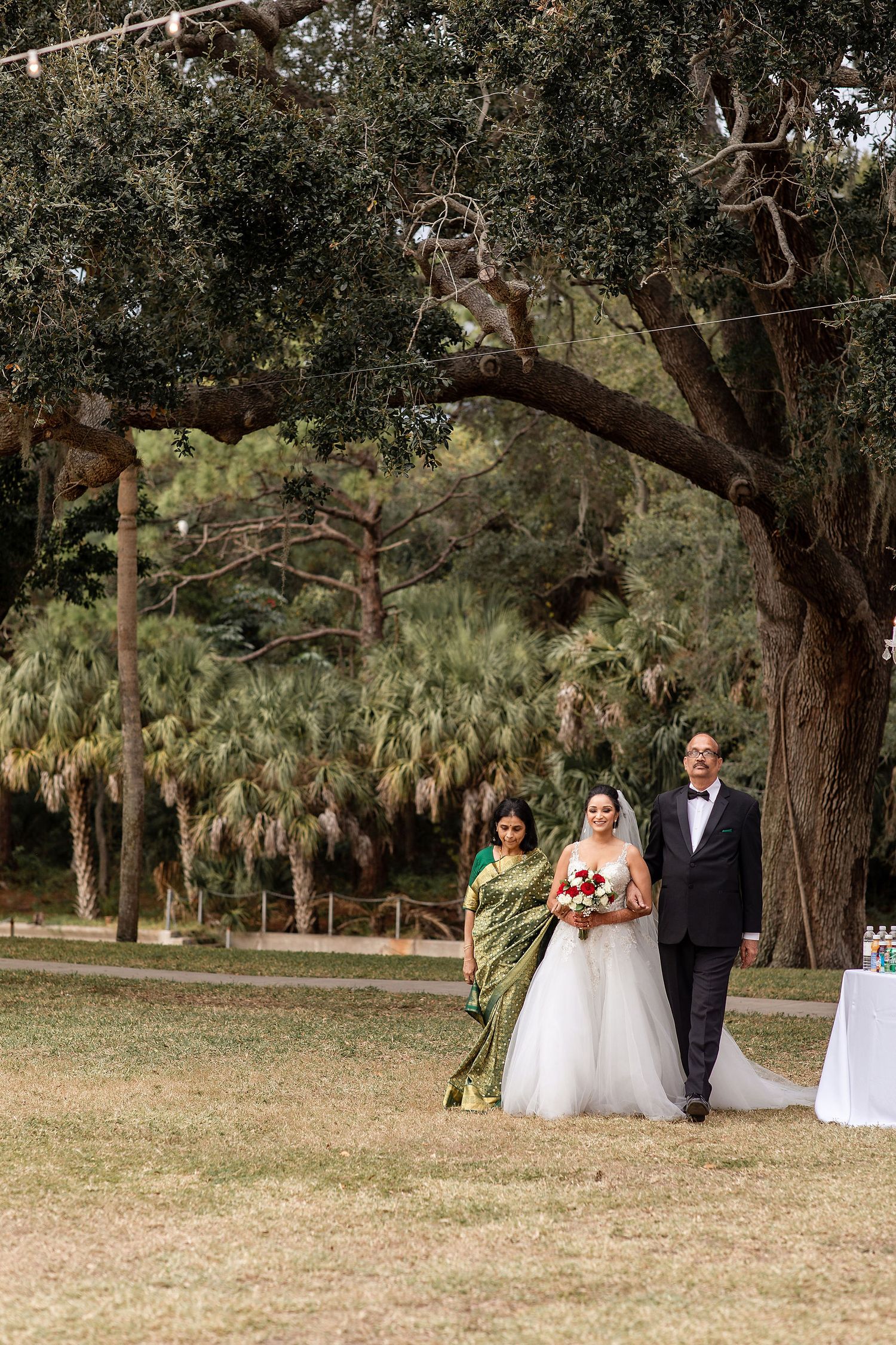 A couple who decided to get married in Sarasota read their vows in front of the guests