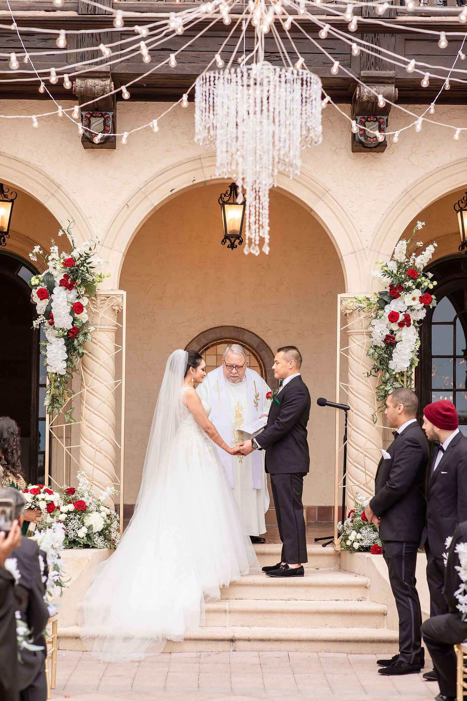 A couple who decided to get married in Sarasota read their vows in front of the guests