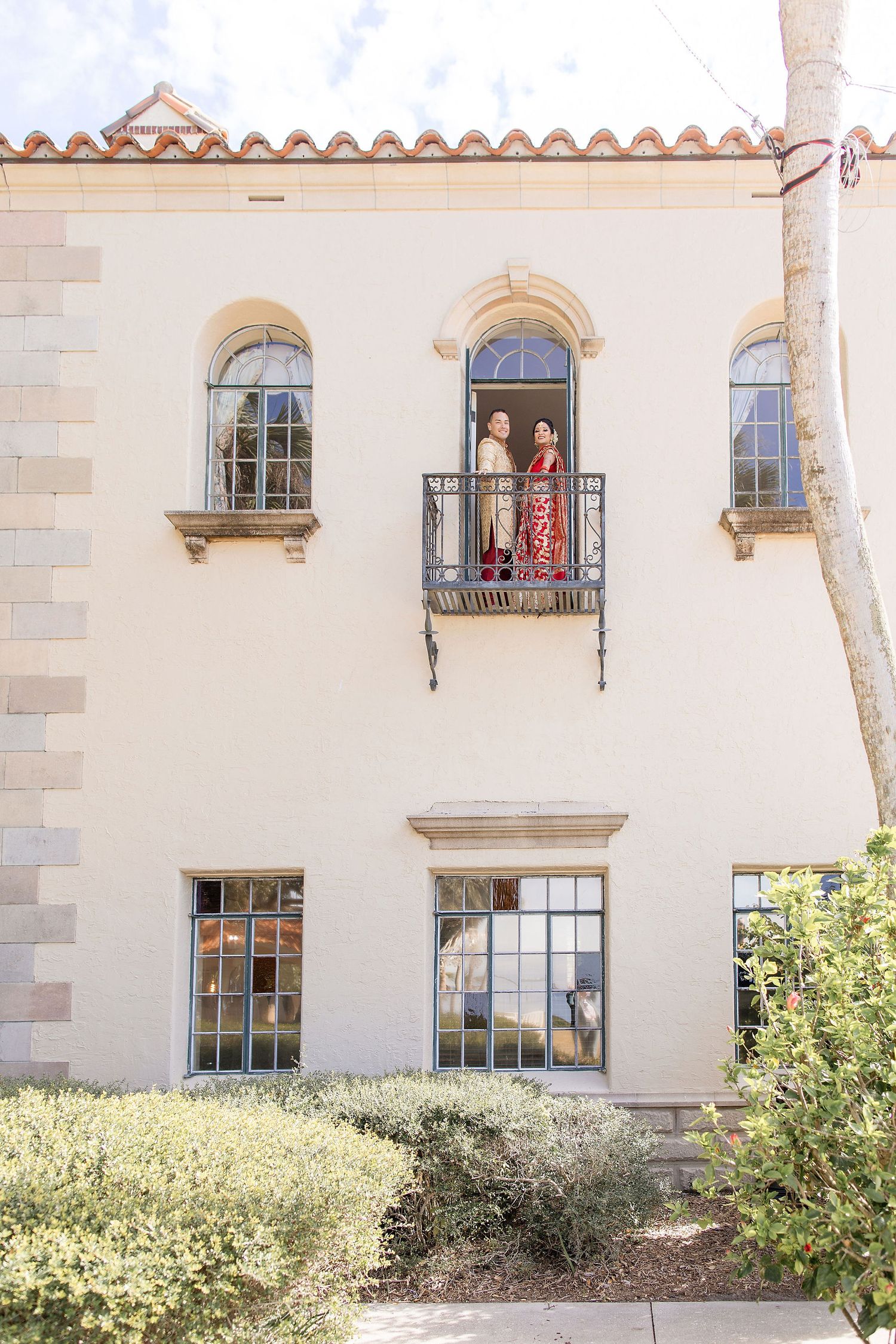 Wide angle view of a garden wedding ceremony at the Powel Crosley Estate Sarasota