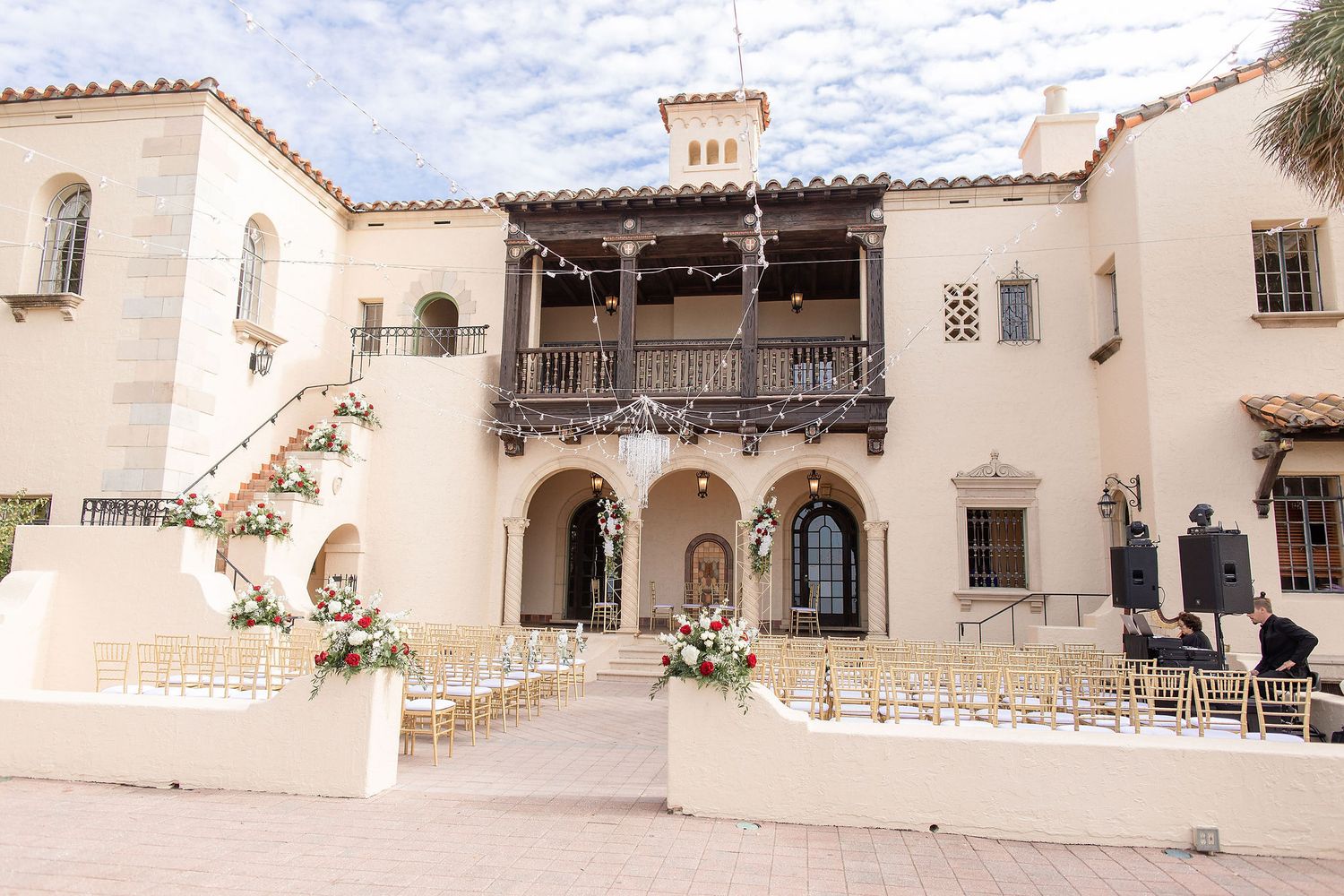 Wide angle view of a garden wedding ceremony at the Powel Crosley Estate Sarasota