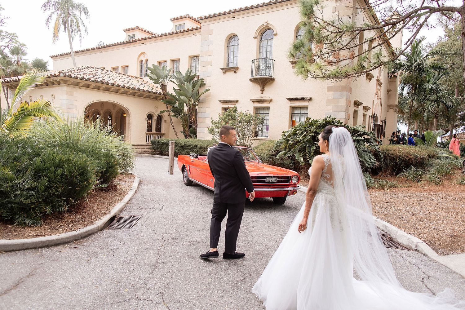 Wide angle view of a garden wedding ceremony at the Powel Crosley Estate Sarasota