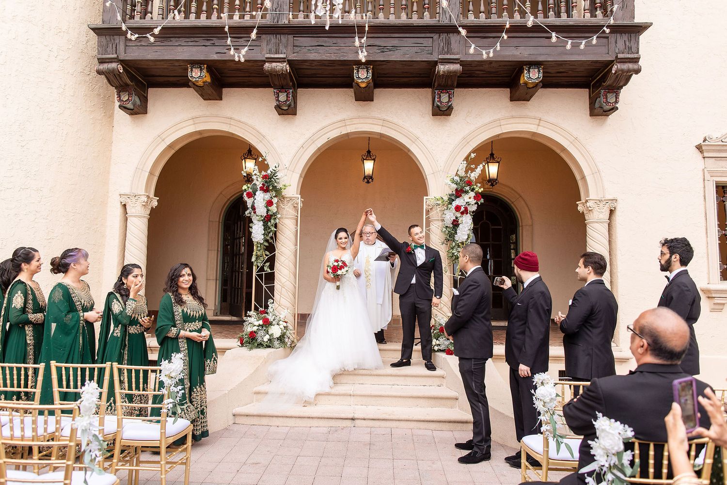 Wide angle view of a garden wedding ceremony at the Powel Crosley Estate Sarasota