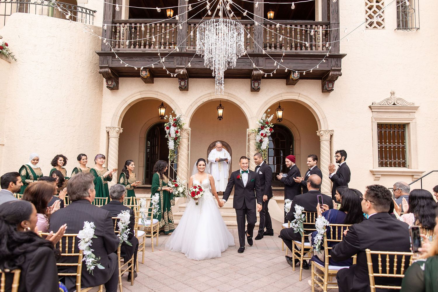 Wide angle view of a garden wedding ceremony at the Powel Crosley Estate Sarasota