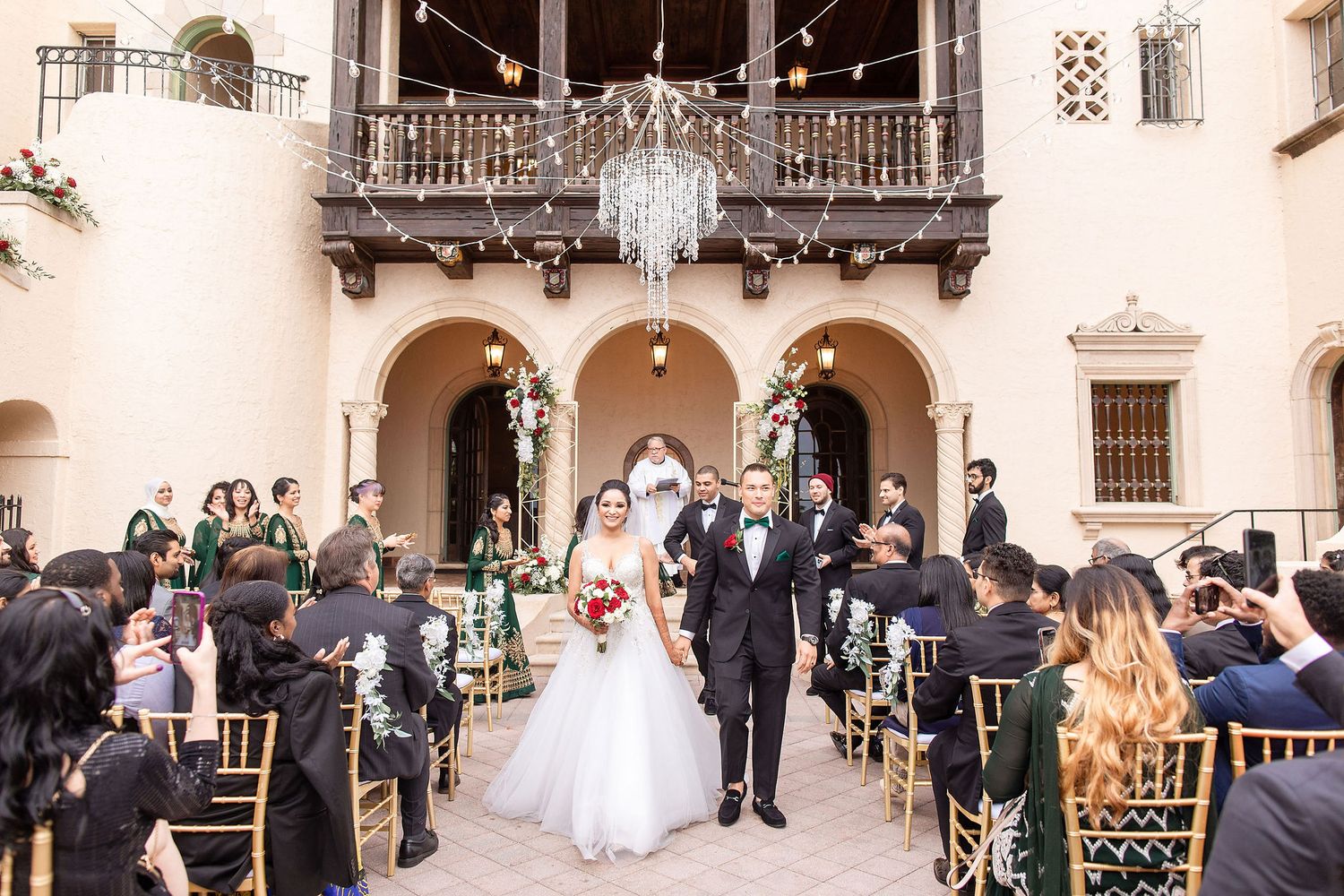 Wide angle view of a garden wedding ceremony at the Powel Crosley Estate Sarasota