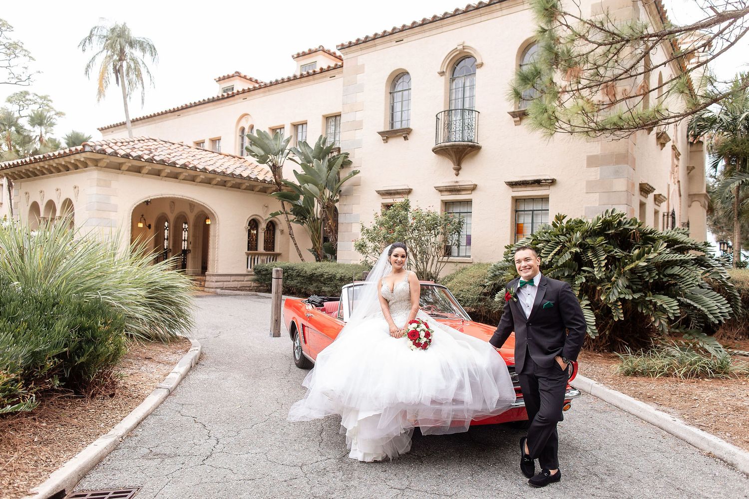 Wide angle view of a garden wedding ceremony at the Powel Crosley Estate Sarasota