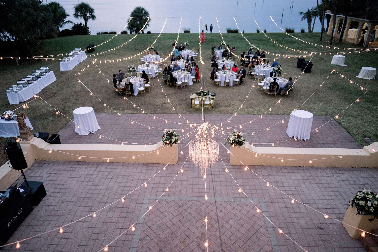 Night portrait of bride and groom on the wedding day with the Powel Crosley Estate on a background