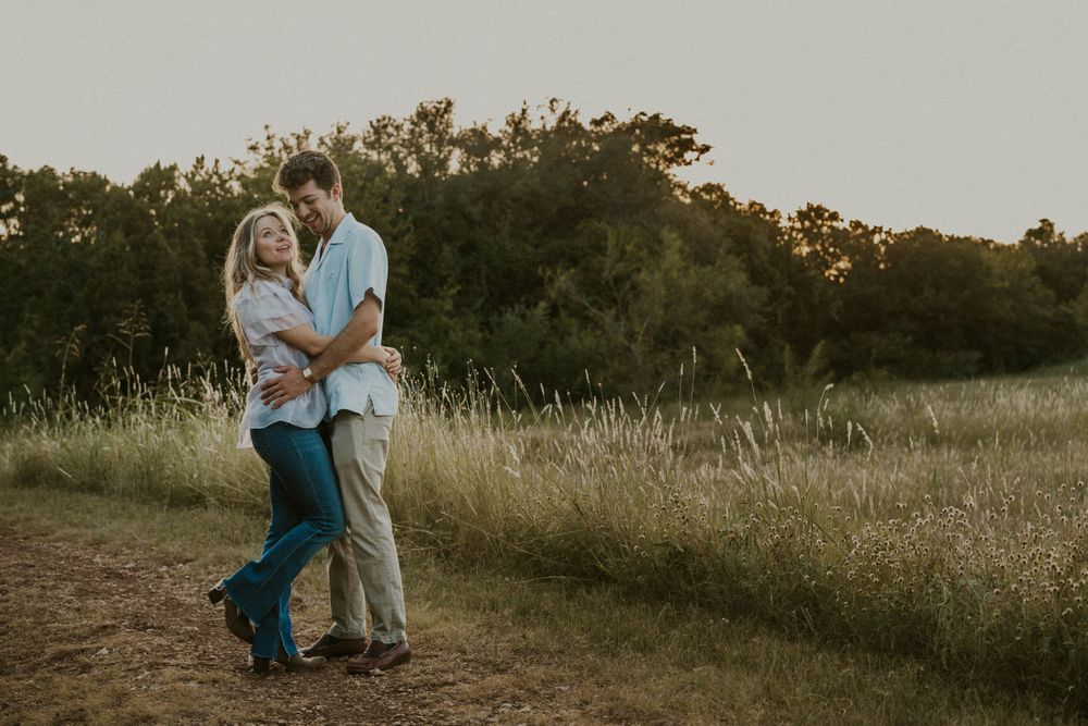 Couple dancing on a dirt road