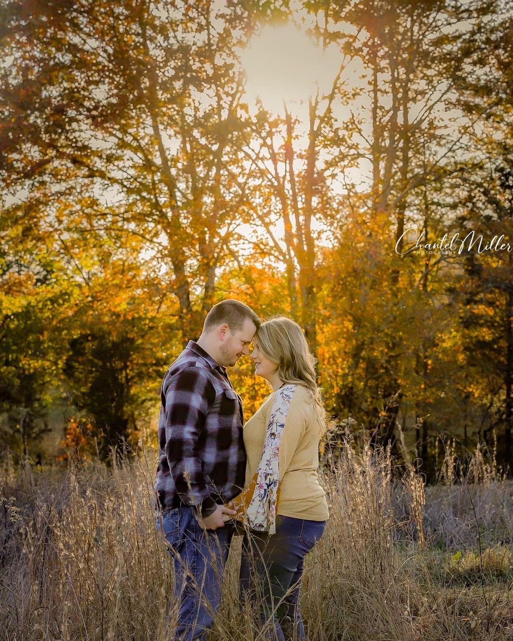 husband and wife touching foreheads