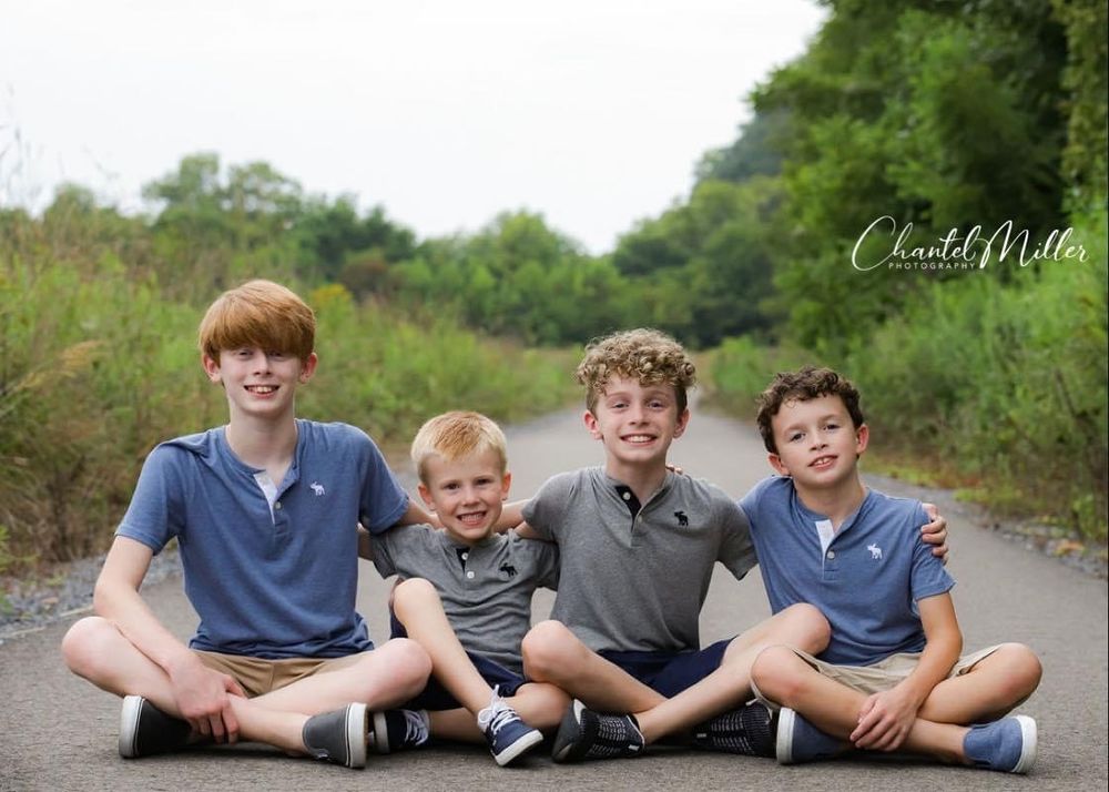 4 brothers sitting together
