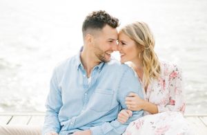 Light and airy film lakeside dock engagement session at Gray's Lake in Des Moines, Iowa