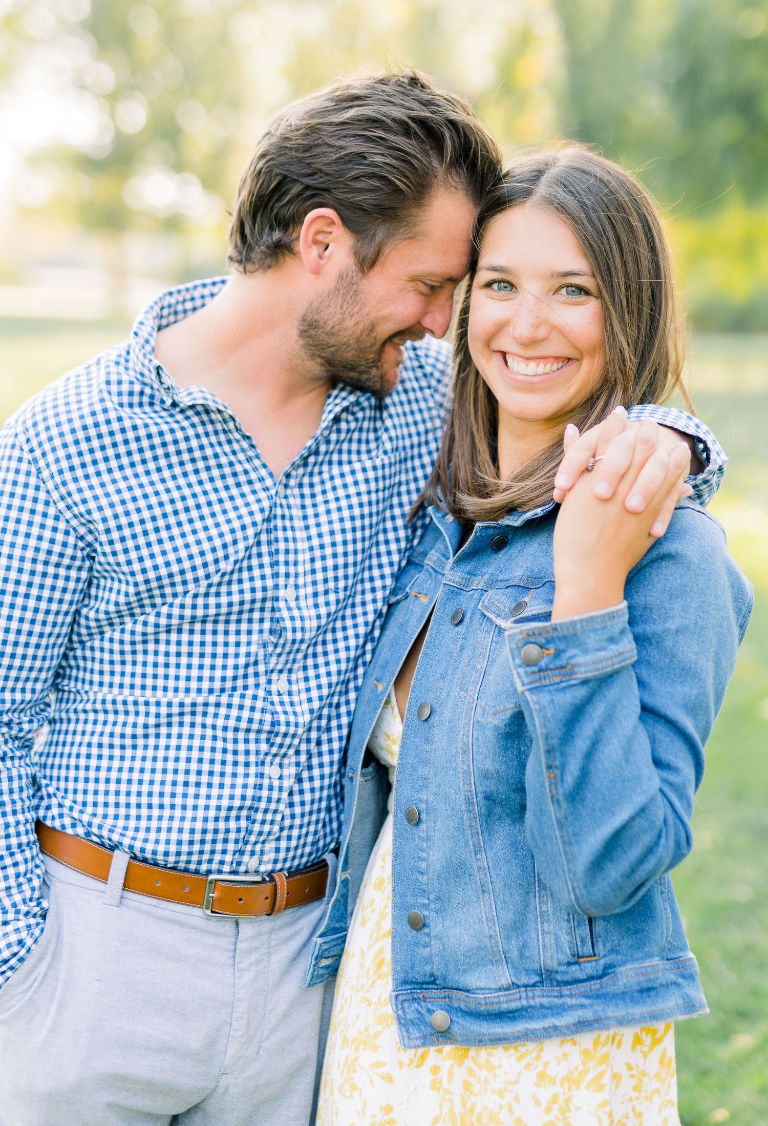 Des Moines Engagement photos at Grays Lake in downtown Des Moines, Iowa with light and airy photographer Nicole Laing