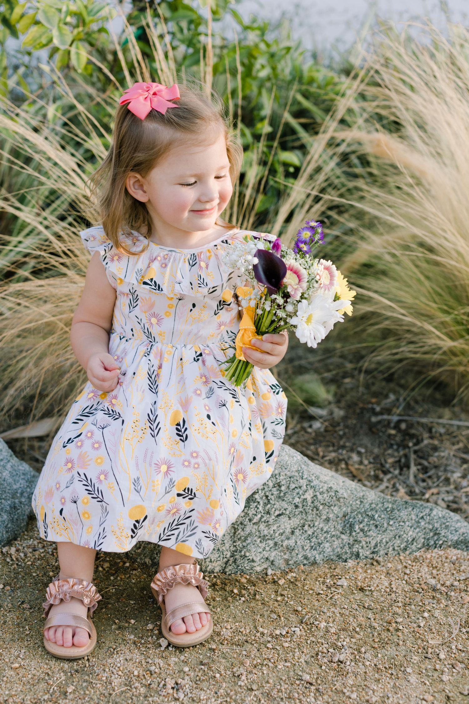 preschool girl with flower bouquet
