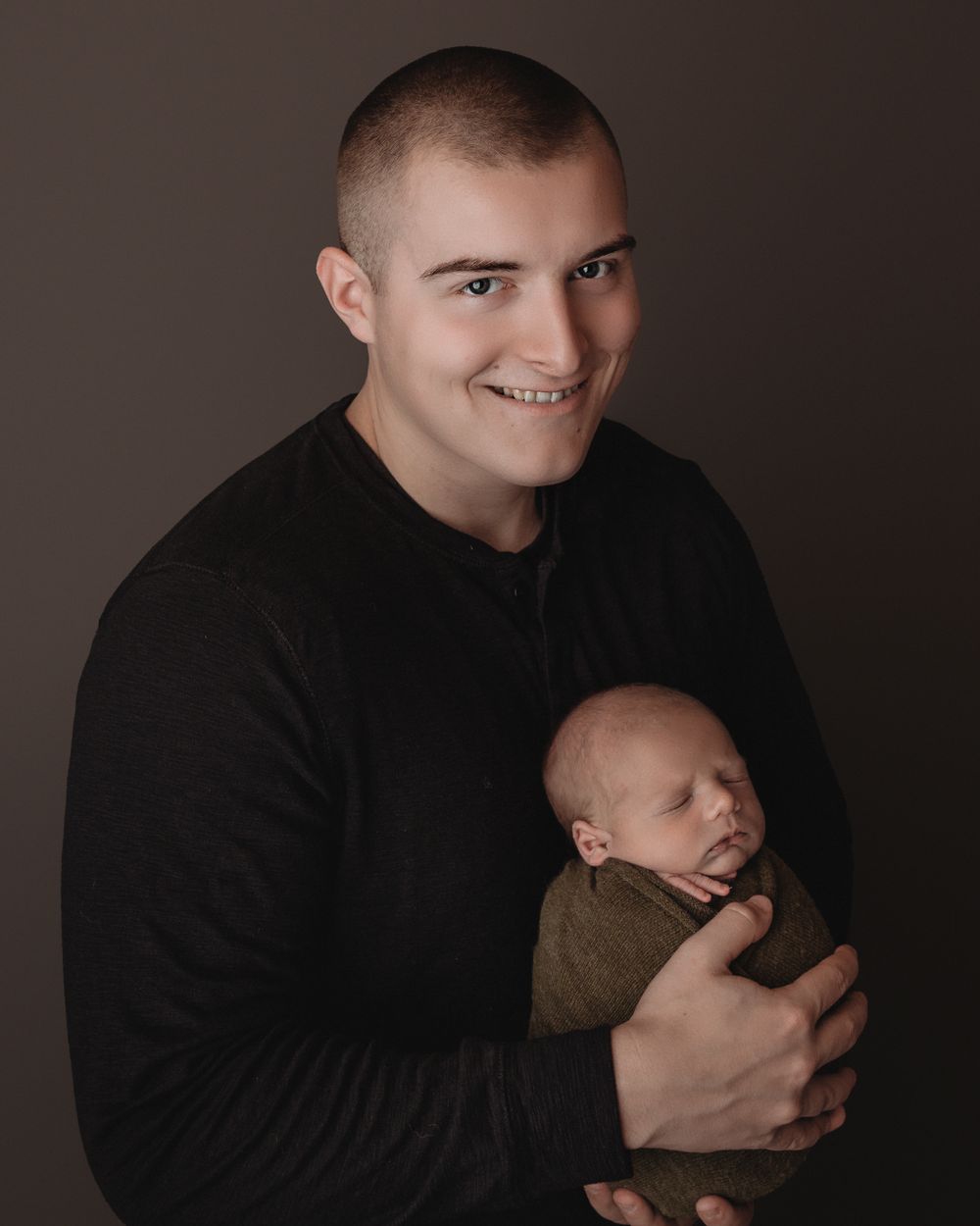 Professional newborn photo with dad