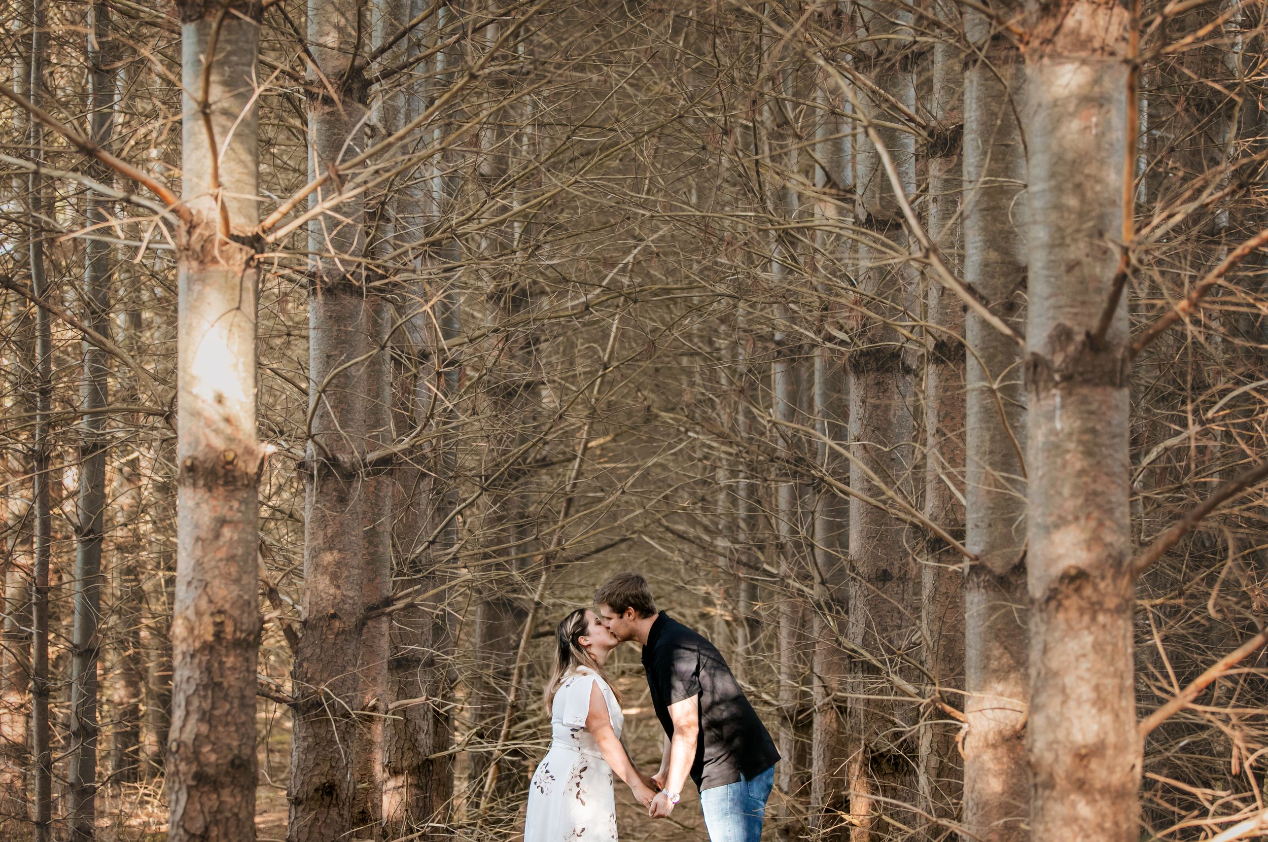Cute and quirky engagement photos at Fanshawe Conservation Area London Ontario by wedding photographer Shawn Van Daele