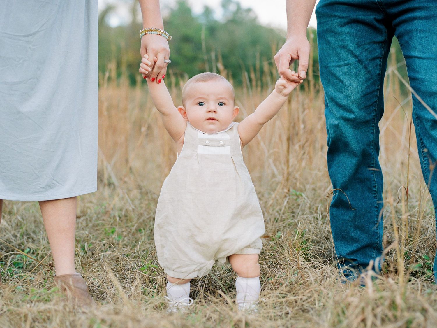 Louisiana family portrait on a church pew in an open field near Bogalusa