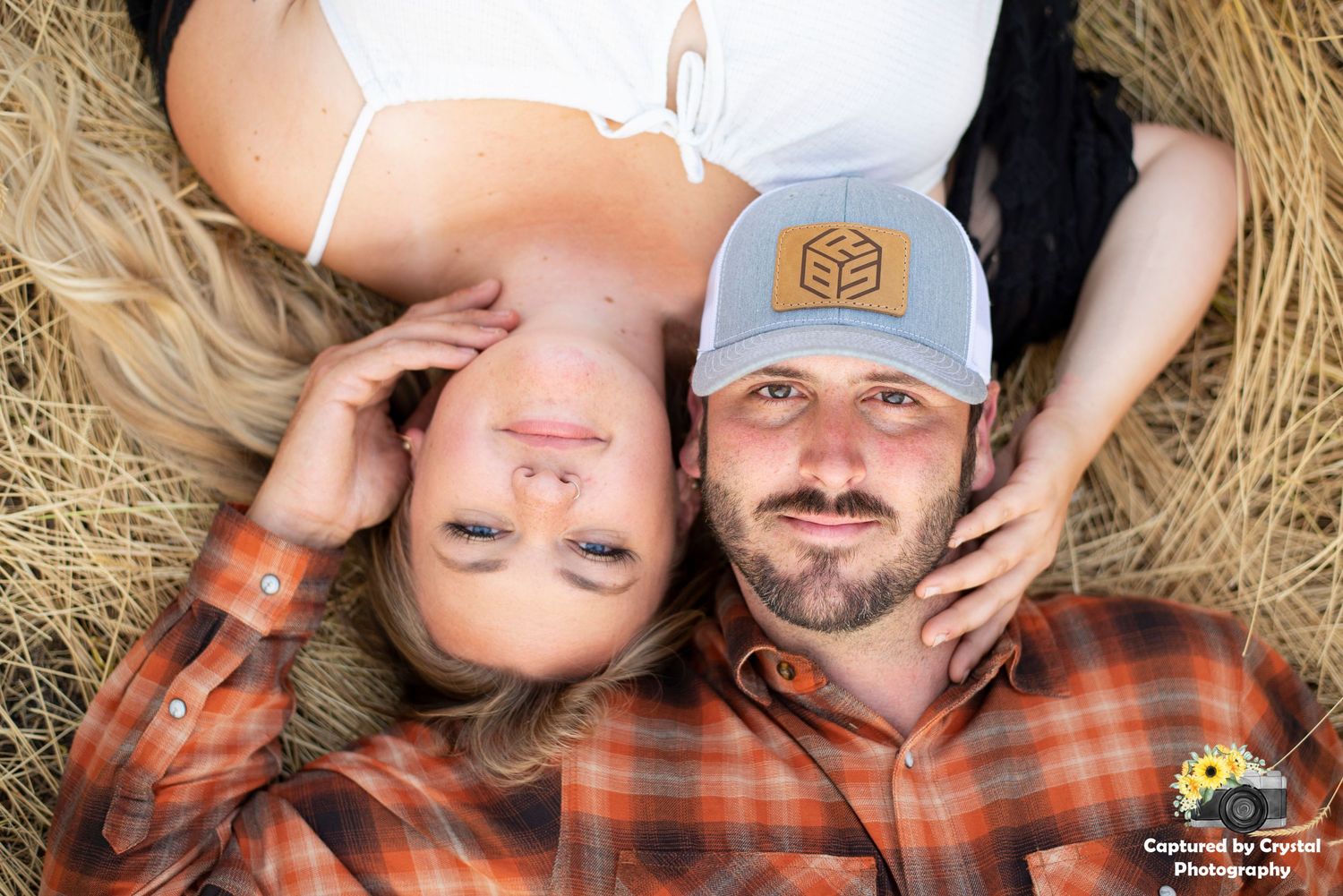 An engaged couple pose for their engagement photoshoot in Ellensburg, Washington.