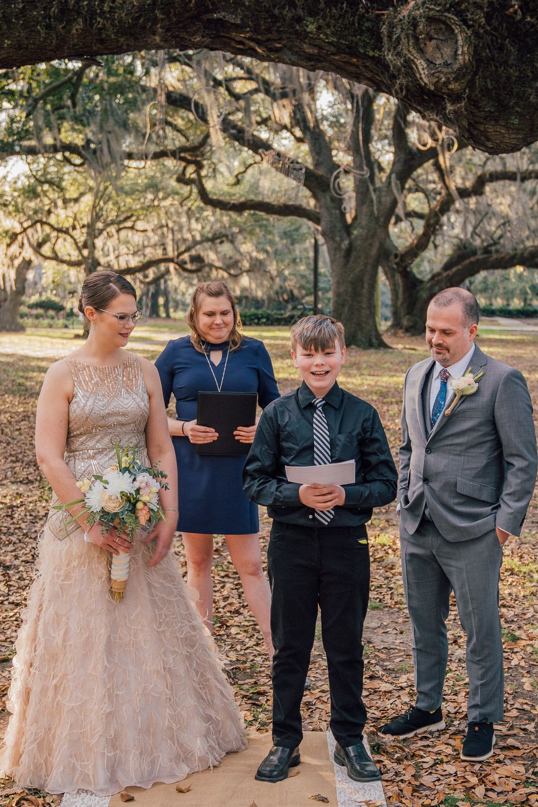Father walking daughter to Casual wedding ceremony in New Orleans City Park
