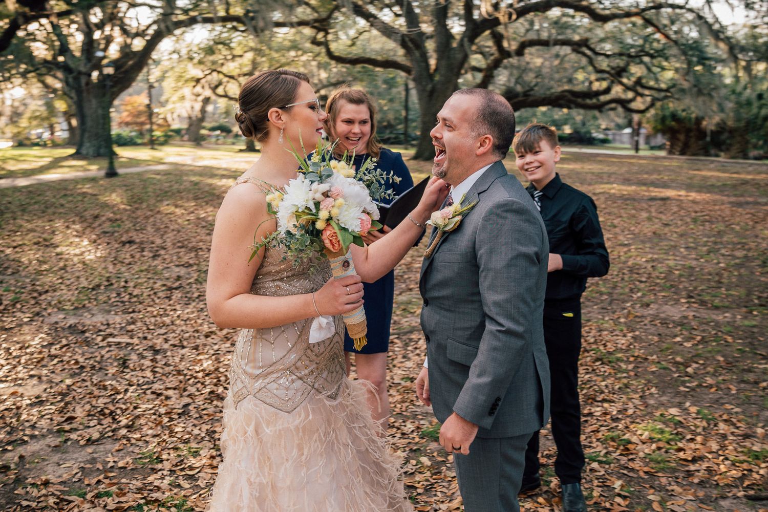 Bride and Groom laughing after wedding ceremony in New Orleans, City Park
