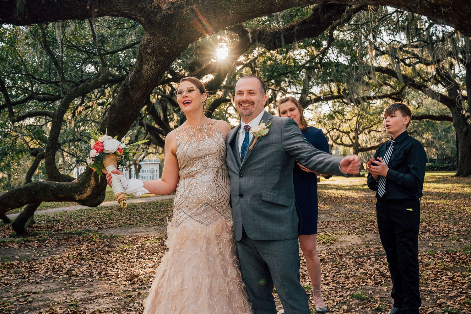 Bride and Groom celebrating wedding ceremony in New Orleans, City Park